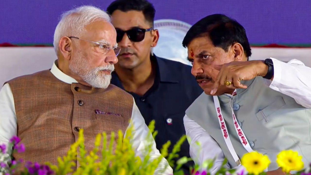 Prime Minister Narendra Modi with Madhya Pradesh CM Mohan Yadav during the foundation stone laying ceremony of the PM MITRA Park. 